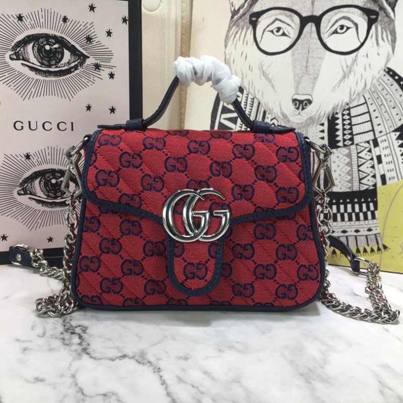 G*u*i top handle bags